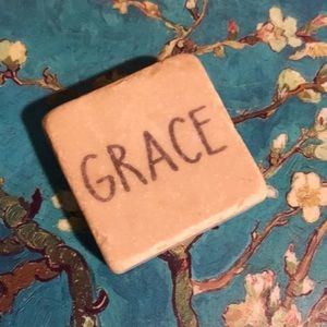 Genuine marble block w/ ‘GRACE’ on it. About 2”x2”. Cream w/brown writing